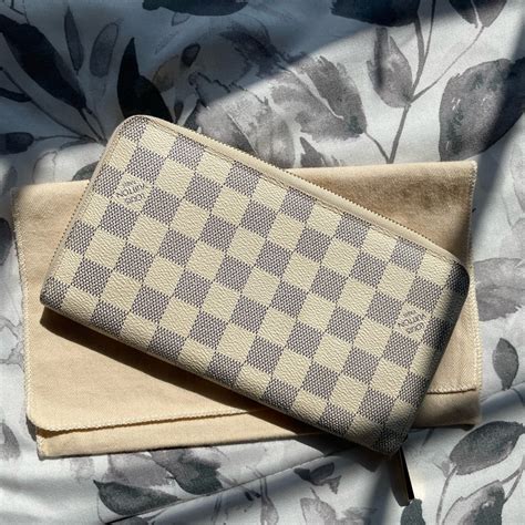 louis vuitton white checkered wallet.